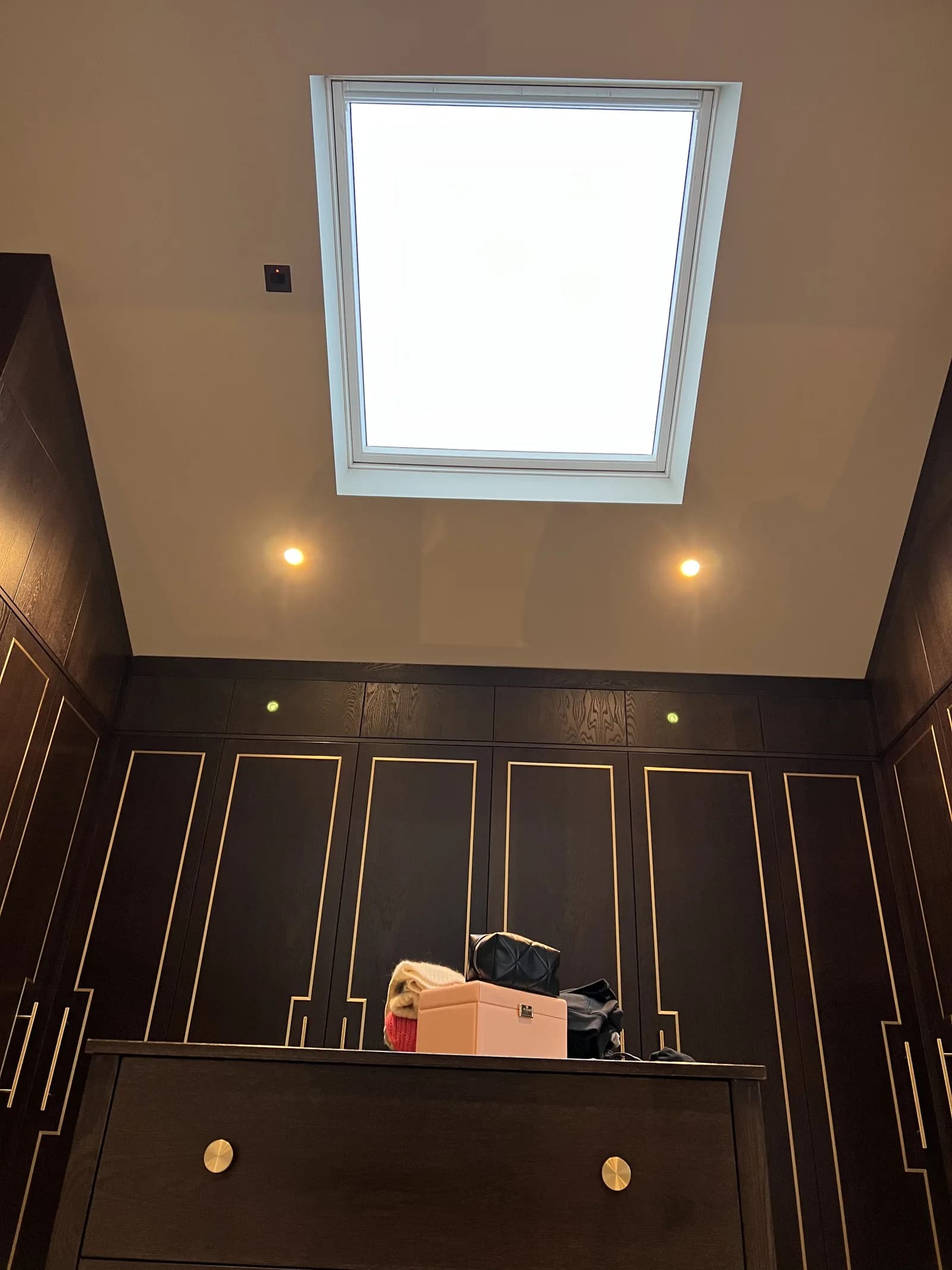 Newly installed roof window in a timber-framed interior