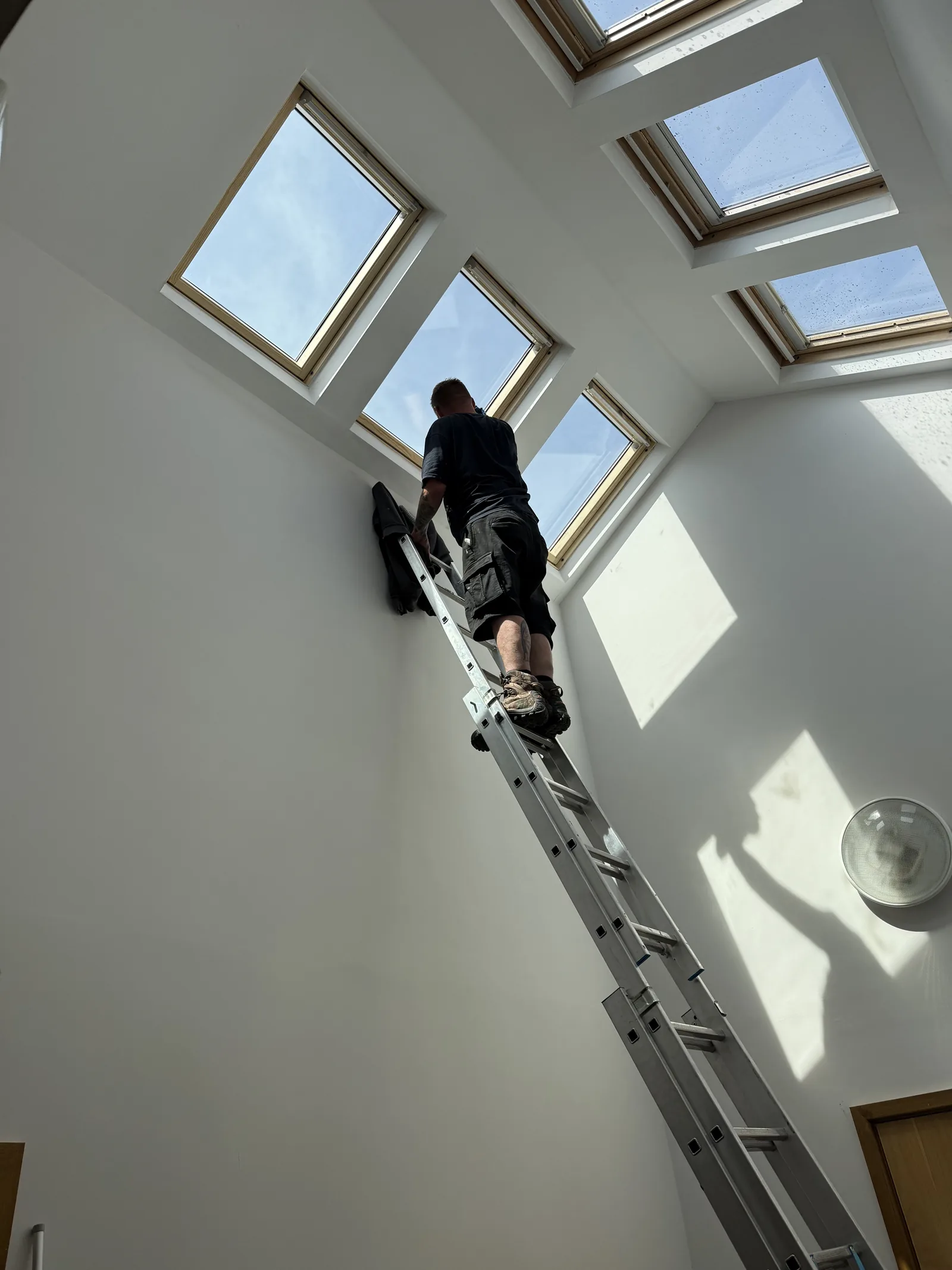 Loft conversion with roof windows during fitting